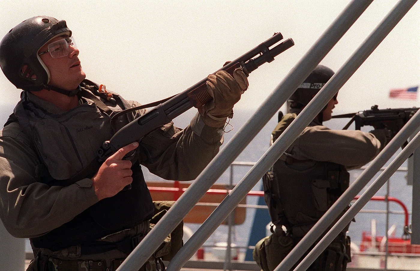 Remington Model 870 pump-action shotgun, side view